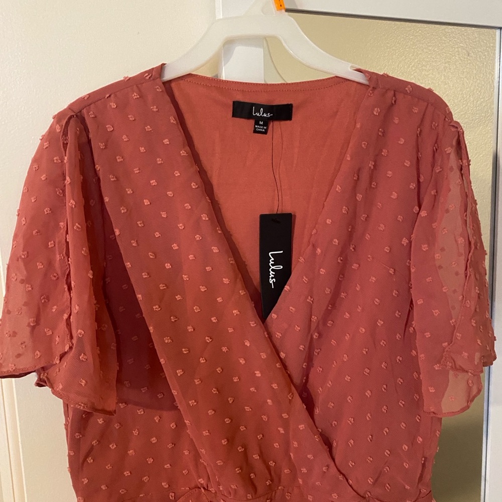 Brand new with tags on it, Lulu’s dress. Size Medium. Perfect fall color
